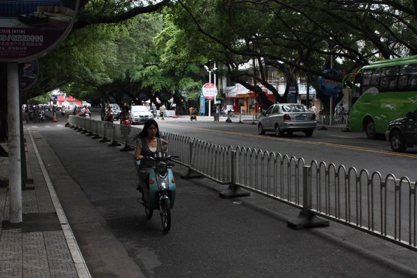 China - Beihai - Girl on Motor Bike