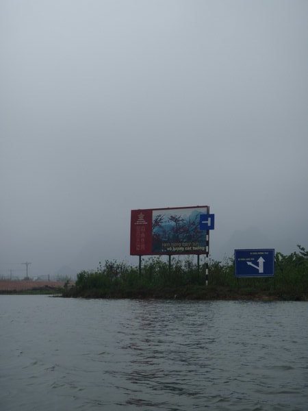 Road signs along the river