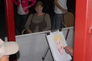 sitting for a caricature