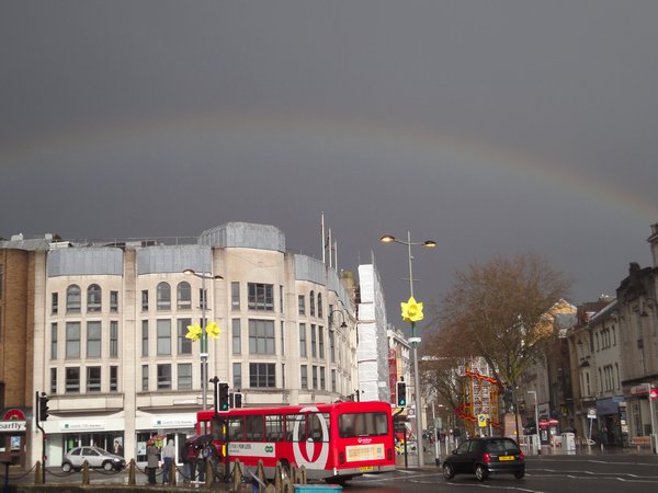 Street scene near Cardiff Castle with rainbow