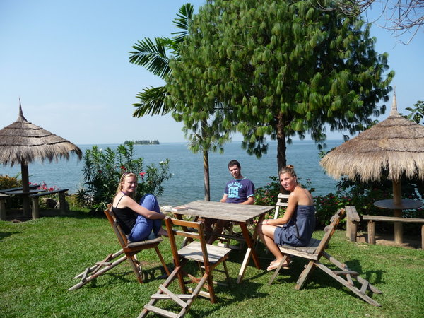 Dee, Mylo and Stef lounging by Lake Gisenye
