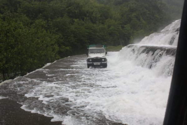 Crossing a dam overflow