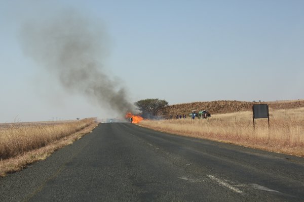 One of the many fires burning a long South African Roads