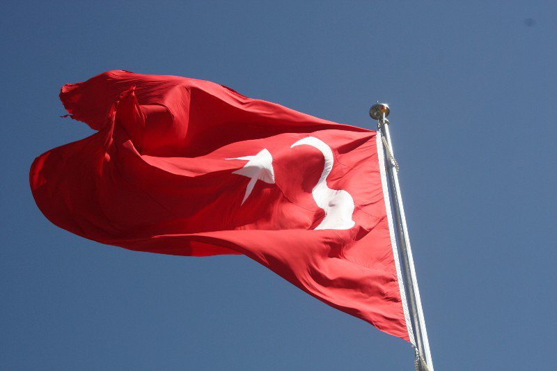 A huge Turkish flag flies above the city