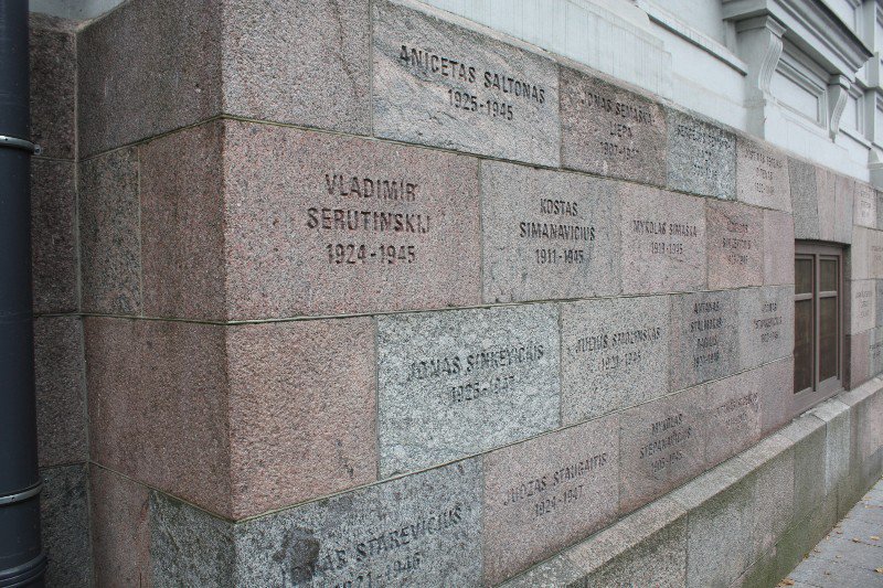 Murder victims names engraved In the facade of the building