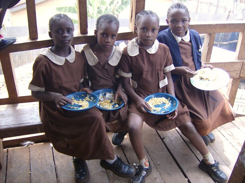 Orphaned Girls having lunch at an orphanage in kibera