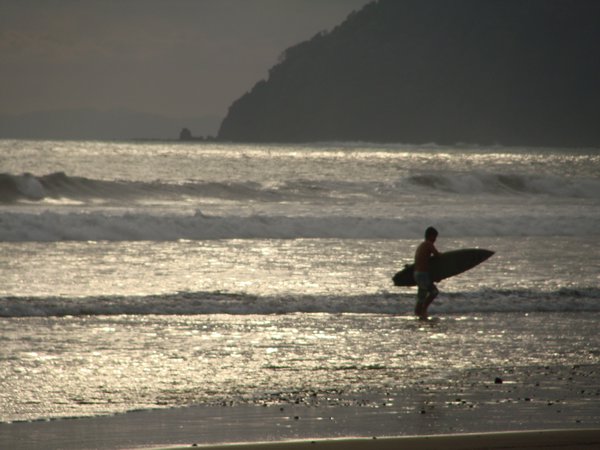 Silhouette of a Surfer in Jaco