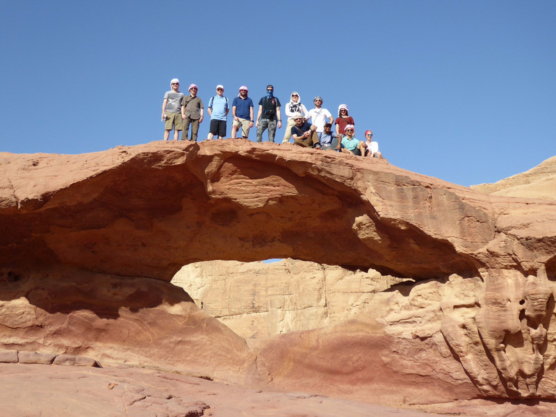 Group Shot on A Rock Arch