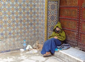 Beggar at Sidi Tijani Mosque