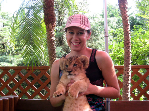 Me with the cheetah cub! (actually I think it was a lion cub)