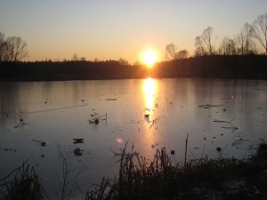 Sunset over the smaller frozen lake