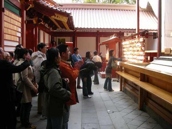 Praying at the shrine