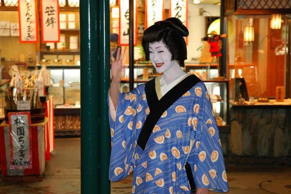 Wow, the ugliest geisha (or wannabe) I have seen - scary!