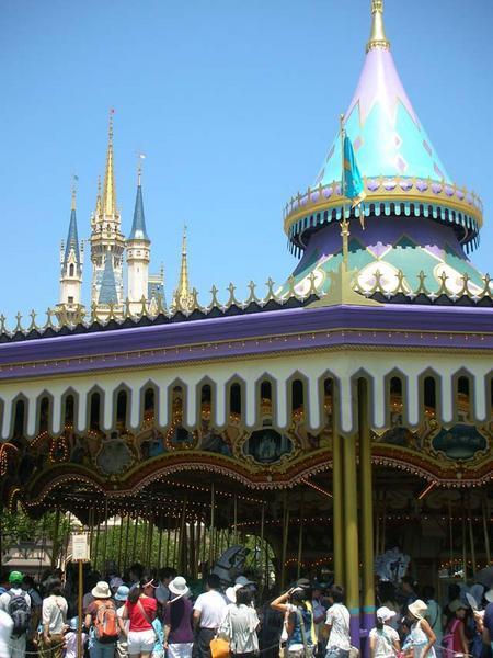 The carousel and castle behind