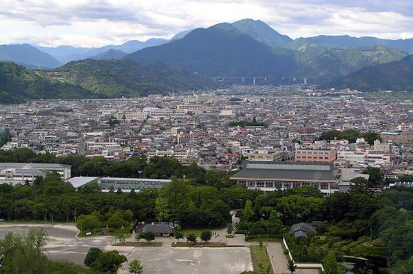 View of Asabata (just below the mountains at the back) from the Prefectural Office Building in the city