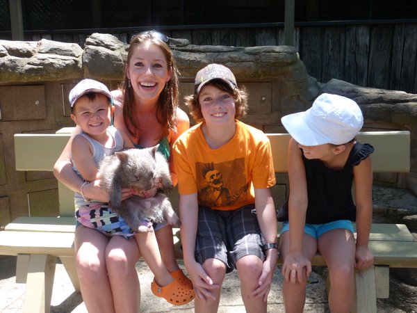Deb and the kids with the baby wombat
