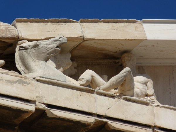 Reliefs carved into the roofline