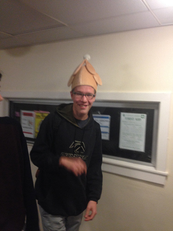 My RA modelling my turkey hat