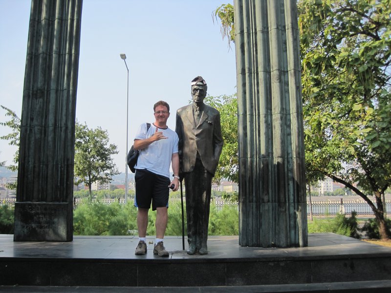 Brazillian guy with statue near Parliament