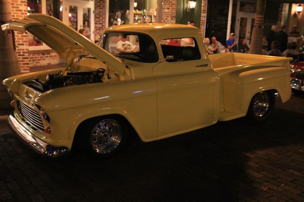 a yellow Ford ? pickup