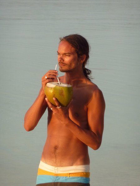 Kei Islands - Drinking coconut with vodka added at Savannah Cottages