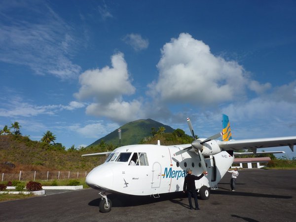Bandaneira - Our little plane with Gunung Api in the background
