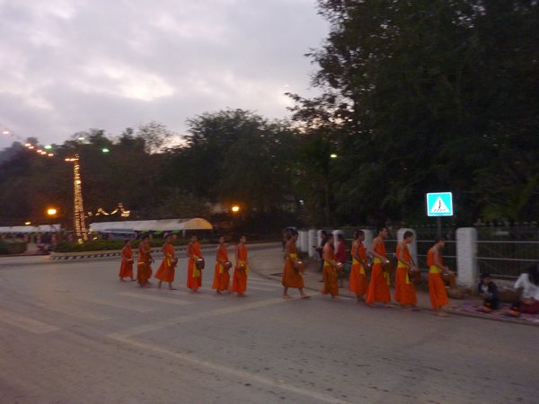 Monks collecting alms in Luang Prabang at 06.00 in the morning
