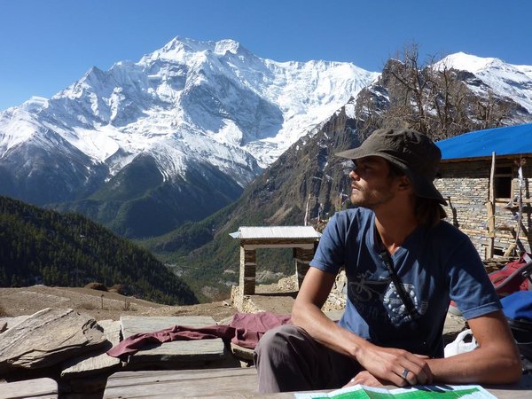 Having our morning coffee break at 3730m, after a steep climb with magnificent views on Annapurna II