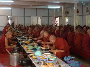 Monks eating in silence at Mahagandhayon Monastery