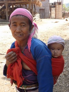Granny and grandkid in a tribe village