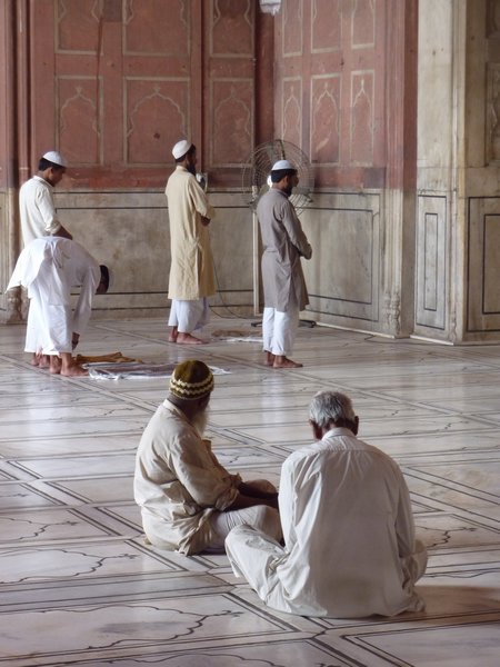 Praying in Jama Masjid Mosque
