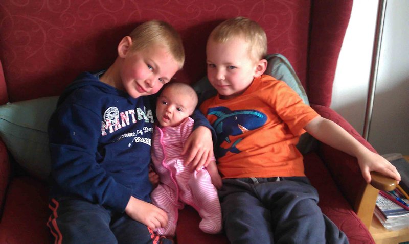 With 2 of her big boy cousins