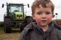 The boy loves tractors