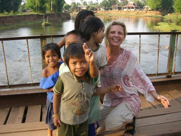Stef with local kids at Tat Lo