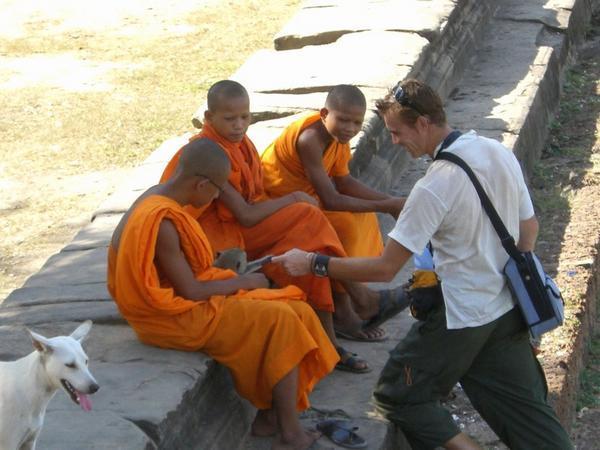 Matt makes friends with a monkey and monks