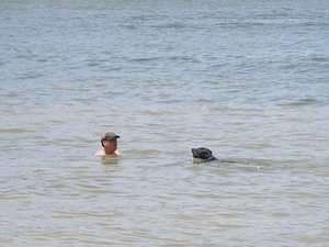 Rich takes a swim in the dam with Woody