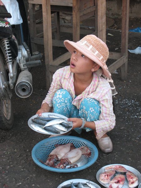 Girl at the Fish Market