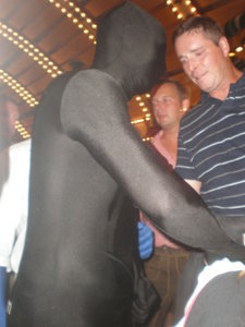 th mysterious black suited man....