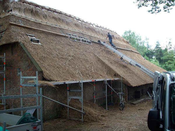 Roof being thatched