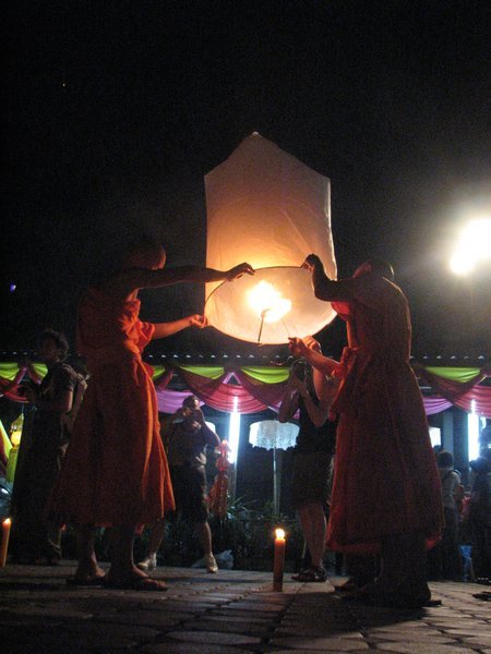 Monks Holding Fire Balloon
