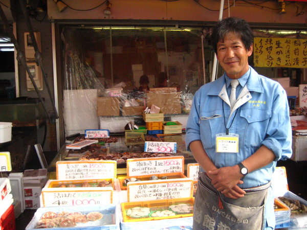 Fish market stall holder in Hakodate market