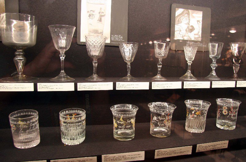 A Display Of Wine Glasses In The Museum