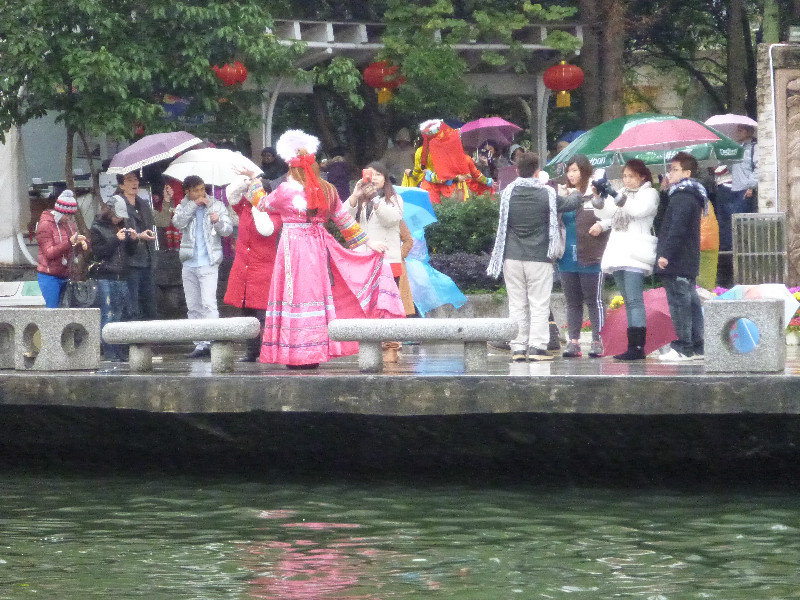 Western Tourists Dressed in Formal Chinese Dress