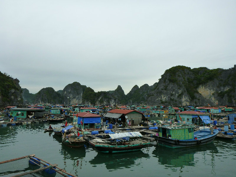 Floating Village hidden on a cove of Halong Bay