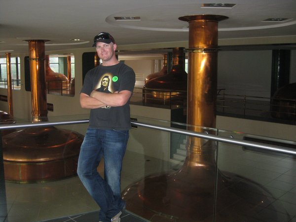 Inside the Pilsner Urquell brewery and surrounded by the copper kettles heating up the beer to 700 degrees celcius