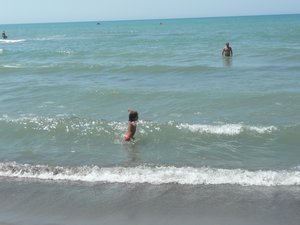 Gioia playing in the sea