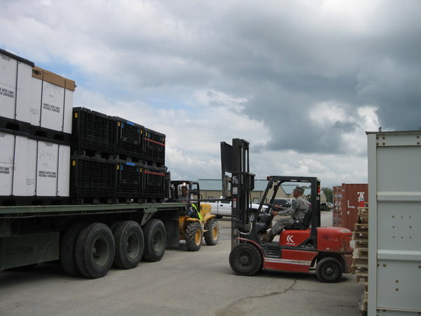 Loading tri-walls up with section equipment