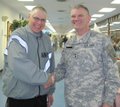 The ND Department of Transportation "Employee of the Year" gets a handshake of congratulations from the General!