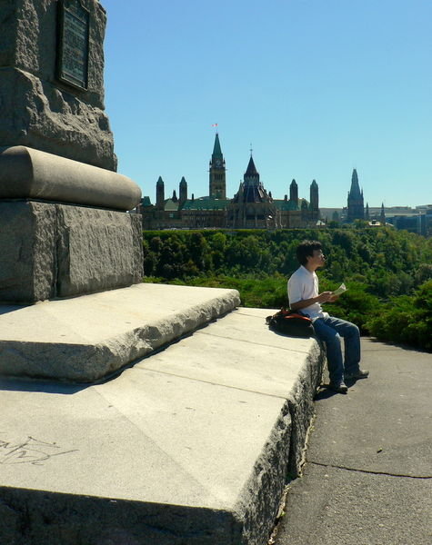 Pondering - at Nepean Point, looking over towards Parliament Hill.