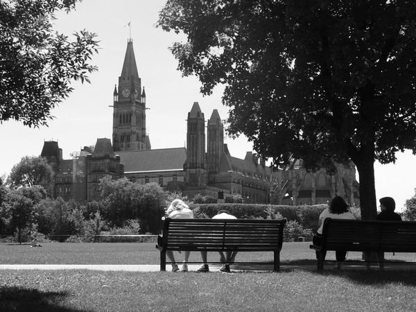 Lazing in the park - Parliament buildings in the background